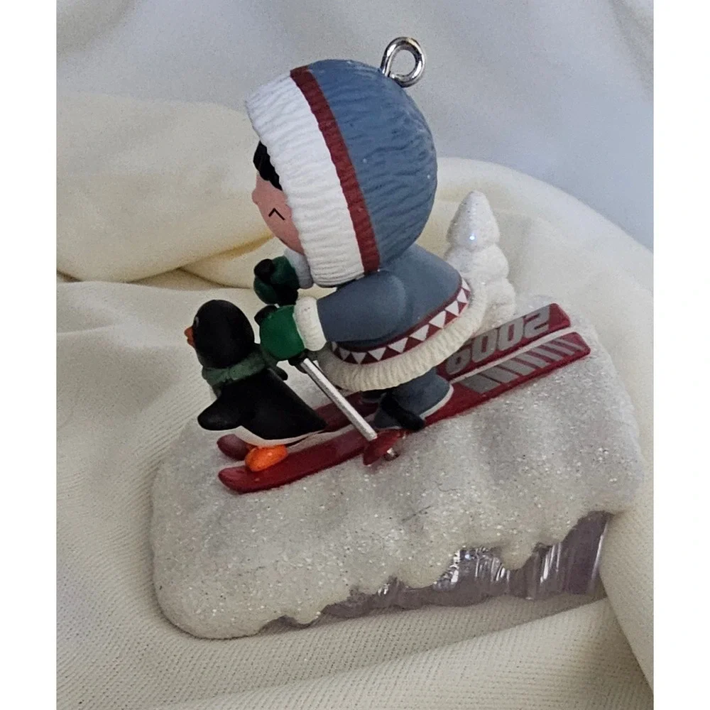 Hallmark Keepsake 2009 Eskimo and Penguin Skiing Christmas Ornament Winter Decor